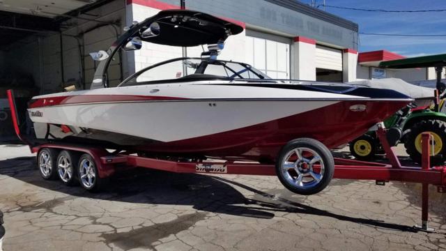 Calibre Marine gallery photo 1: Wake boat on its trailer at the shop