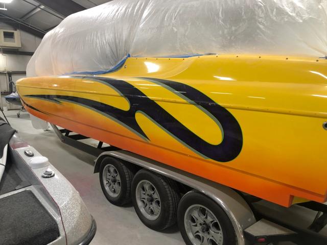 Calibre Marine gallery photo 16: Custom paint — orange fade with flames